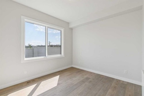 162 Drystone Way Nw, Calgary, AB - Indoor Photo Showing Other Room