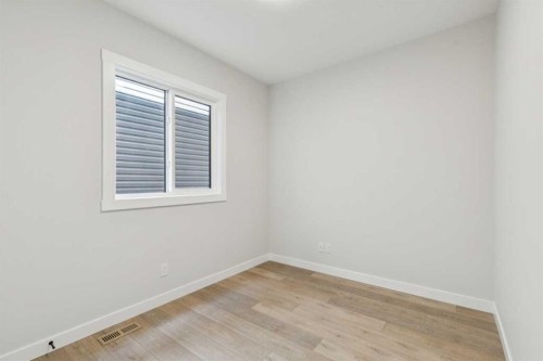 162 Drystone Way Nw, Calgary, AB - Indoor Photo Showing Other Room