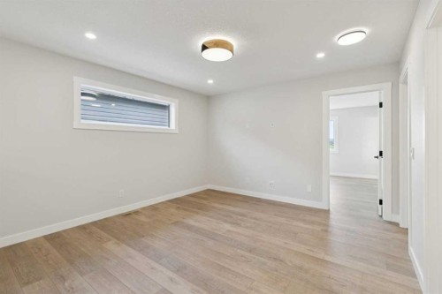 162 Drystone Way Nw, Calgary, AB - Indoor Photo Showing Other Room