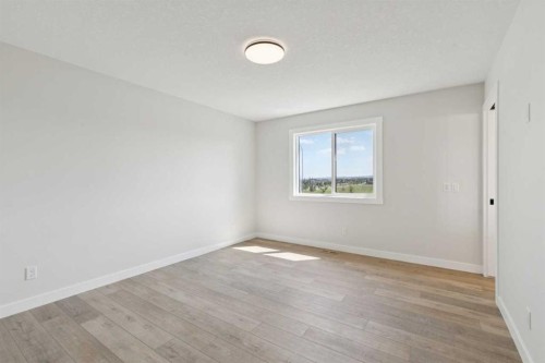 162 Drystone Way Nw, Calgary, AB - Indoor Photo Showing Other Room