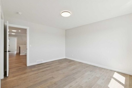 162 Drystone Way Nw, Calgary, AB - Indoor Photo Showing Other Room