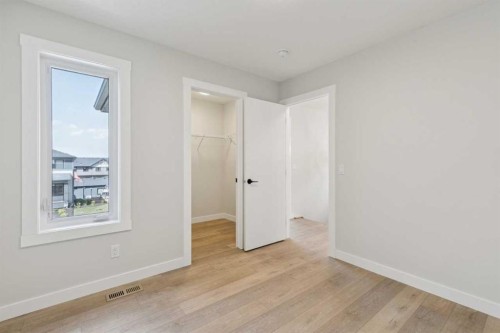 162 Drystone Way Nw, Calgary, AB - Indoor Photo Showing Other Room