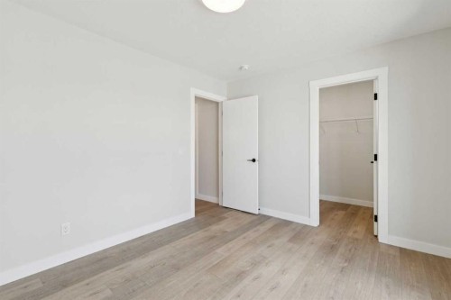 162 Drystone Way Nw, Calgary, AB - Indoor Photo Showing Other Room
