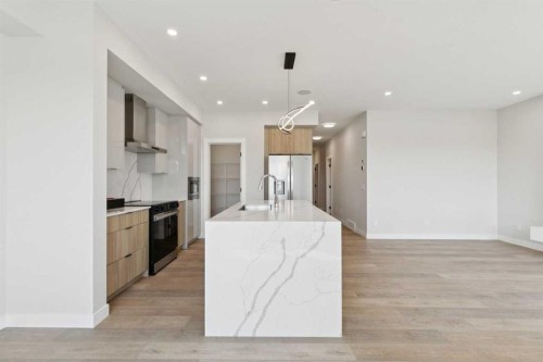 162 Drystone Way Nw, Calgary, AB - Indoor Photo Showing Kitchen With Upgraded Kitchen