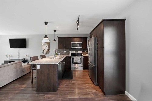 34 Rafferty Court, Sylvan Lake, AB - Indoor Photo Showing Kitchen With Double Sink