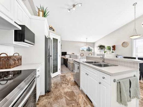 2-6220 Orr Drive, Red Deer, AB - Indoor Photo Showing Kitchen With Double Sink