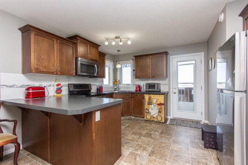 146 Truant Crescent, Red Deer, AB - Indoor Photo Showing Kitchen With Double Sink
