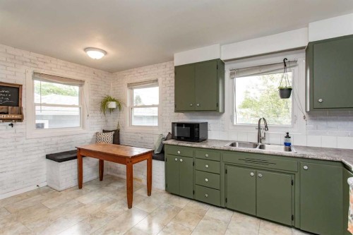 5709 49 Avenue, Lacombe, AB - Indoor Photo Showing Kitchen With Double Sink