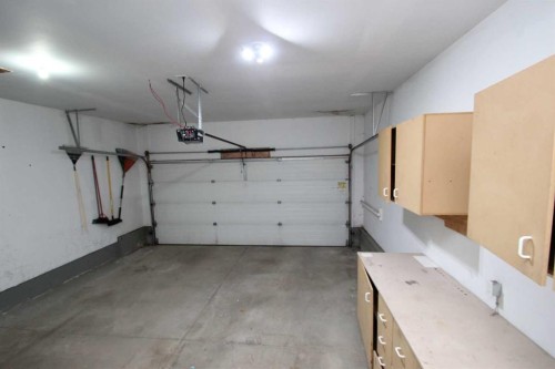 52-73 Addington Drive, Red Deer, AB - Indoor Photo Showing Garage