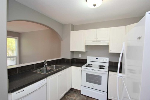 52-73 Addington Drive, Red Deer, AB - Indoor Photo Showing Kitchen With Double Sink