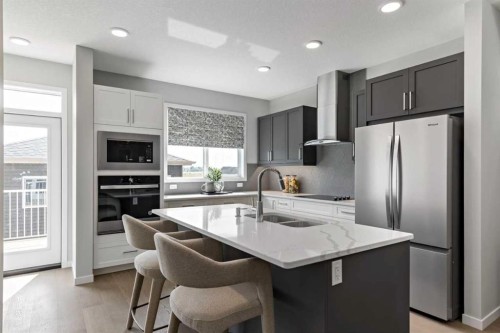 447 Chelsea Port Crossing, Chestermere, AB - Indoor Photo Showing Kitchen With Upgraded Kitchen