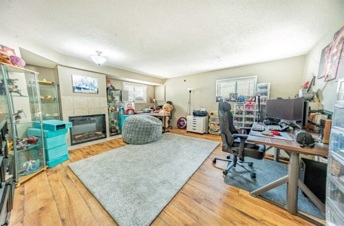 27 Escott Close, Red Deer, AB - Indoor With Fireplace