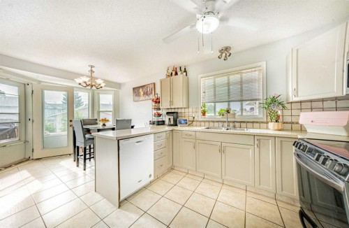 27 Escott Close, Red Deer, AB - Indoor Photo Showing Kitchen With Double Sink