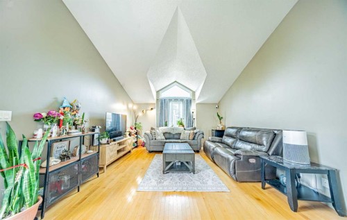 27 Escott Close, Red Deer, AB - Indoor Photo Showing Other Room With Fireplace