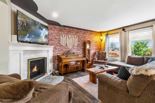 56 Jones Crescent, Red Deer, AB - Indoor Photo Showing Living Room With Fireplace