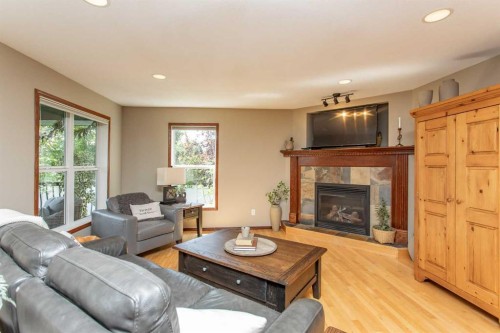 715 700 Ramage Close, Red Deer, AB - Indoor Photo Showing Living Room With Fireplace