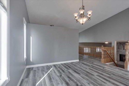 134 Douglas Avenue, Red Deer, AB - Indoor Photo Showing Other Room With Fireplace