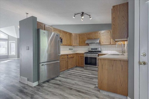 134 Douglas Avenue, Red Deer, AB - Indoor Photo Showing Kitchen With Stainless Steel Kitchen