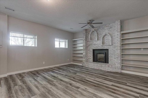 134 Douglas Avenue, Red Deer, AB - Indoor With Fireplace