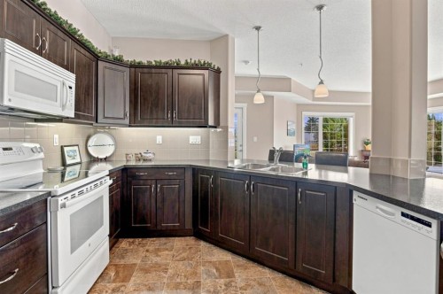 226-6 Michener Boulevard, Red Deer, AB - Indoor Photo Showing Kitchen With Double Sink