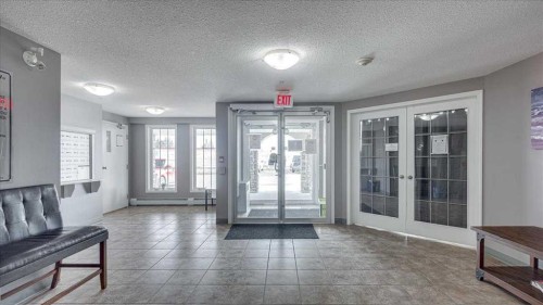 410-3 Broadway Rise, Sylvan Lake, AB - Indoor Photo Showing Other Room