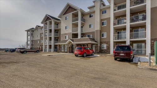 410-3 Broadway Rise, Sylvan Lake, AB - Outdoor With Balcony With Facade
