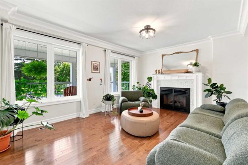 5808 43 Avenue, Red Deer, AB - Indoor Photo Showing Living Room With Fireplace