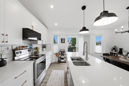 355 Duston Street, Red Deer, AB - Indoor Photo Showing Kitchen With Stainless Steel Kitchen With Double Sink With Upgraded Kitchen