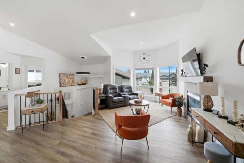355 Duston Street, Red Deer, AB - Indoor Photo Showing Living Room With Fireplace