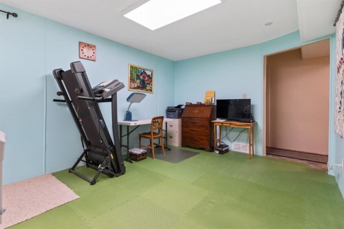 4609 45 Street, Camrose, AB - Indoor Photo Showing Gym Room