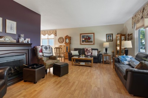 4609 45 Street, Camrose, AB - Indoor Photo Showing Living Room With Fireplace
