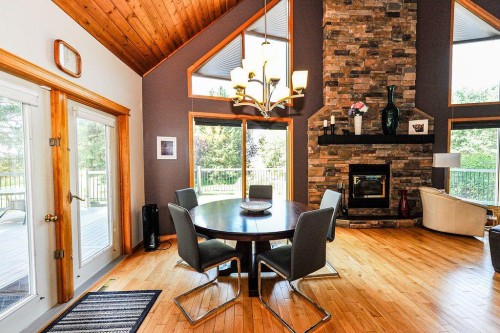 46237 Rr 202, Rural Camrose County, AB - Indoor Photo Showing Dining Room With Fireplace