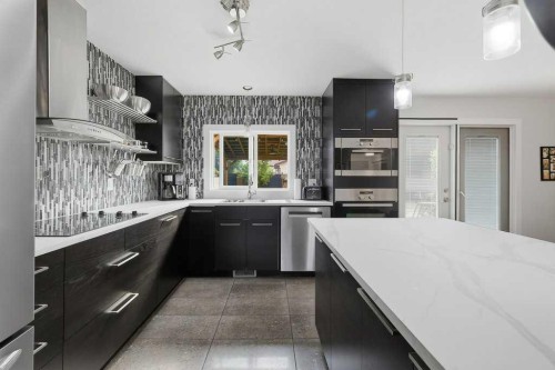 49 Macfarlane Avenue, Red Deer, AB - Indoor Photo Showing Kitchen With Upgraded Kitchen