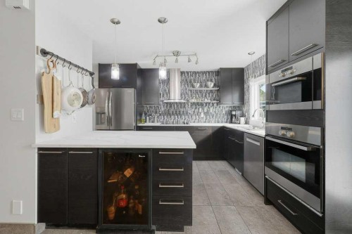 49 Macfarlane Avenue, Red Deer, AB - Indoor Photo Showing Kitchen With Upgraded Kitchen
