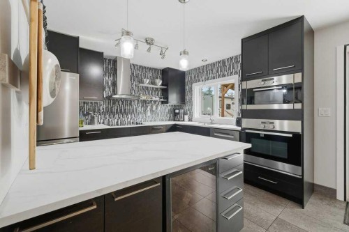 49 Macfarlane Avenue, Red Deer, AB - Indoor Photo Showing Kitchen With Upgraded Kitchen