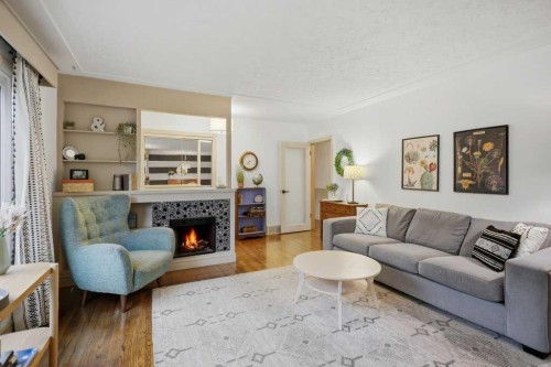 3501 Spruce Drive, Red Deer, AB - Indoor Photo Showing Living Room With Fireplace