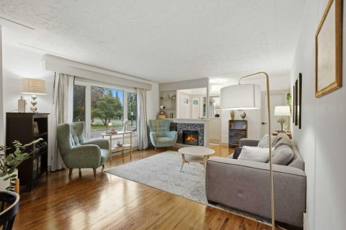 3501 Spruce Drive, Red Deer, AB - Indoor Photo Showing Living Room With Fireplace