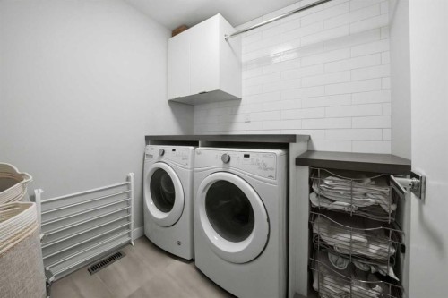 102 Longmire Close, Red Deer, AB - Indoor Photo Showing Laundry Room