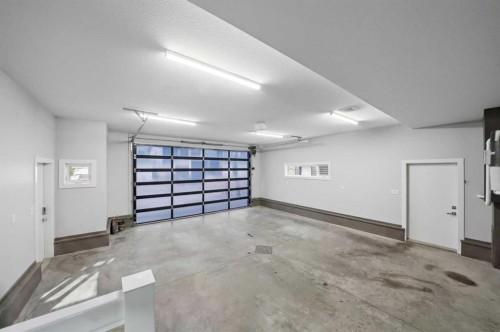 102 Longmire Close, Red Deer, AB - Indoor Photo Showing Garage