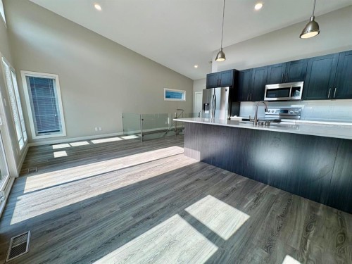 14-5110 48A Avenue, Camrose, AB - Indoor Photo Showing Kitchen With Upgraded Kitchen