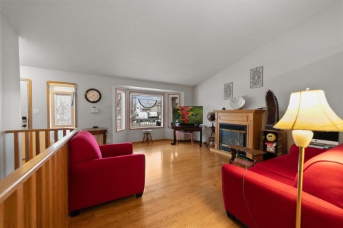 6308 30 Avenue, Camrose, AB - Indoor Photo Showing Living Room With Fireplace