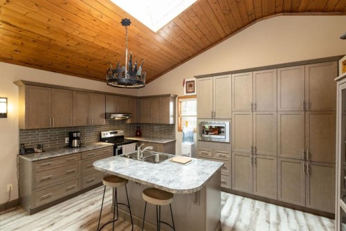 3411 Highway 54, Rural Red Deer County, AB - Indoor Photo Showing Kitchen With Double Sink With Upgraded Kitchen