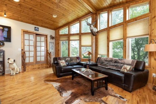 3411 Highway 54, Rural Red Deer County, AB - Indoor Photo Showing Living Room With Fireplace