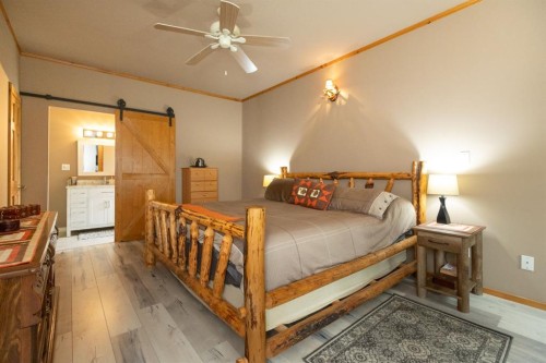 3411 Highway 54, Rural Red Deer County, AB - Indoor Photo Showing Bedroom