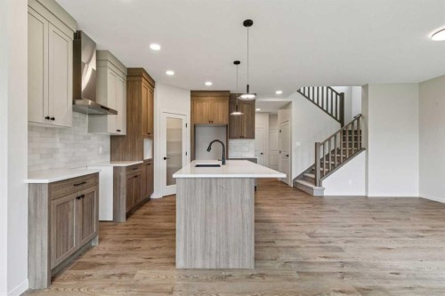 660 Clearwater Heath, Chestermere, AB - Indoor Photo Showing Kitchen With Upgraded Kitchen