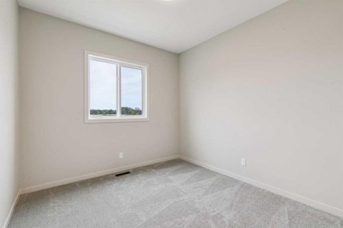 660 Clearwater Heath, Chestermere, AB - Indoor Photo Showing Other Room