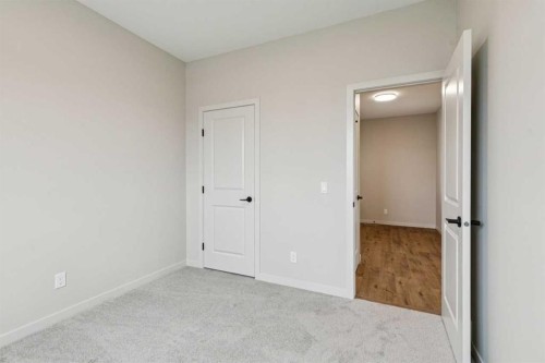 660 Clearwater Heath, Chestermere, AB - Indoor Photo Showing Other Room