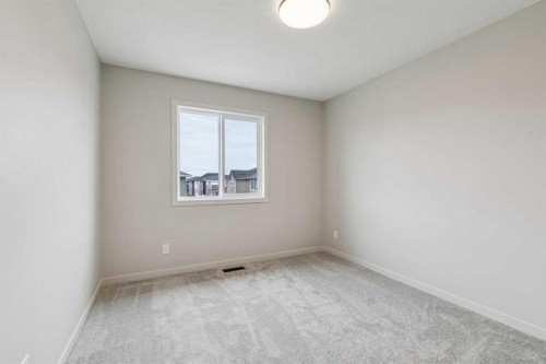 660 Clearwater Heath, Chestermere, AB - Indoor Photo Showing Other Room