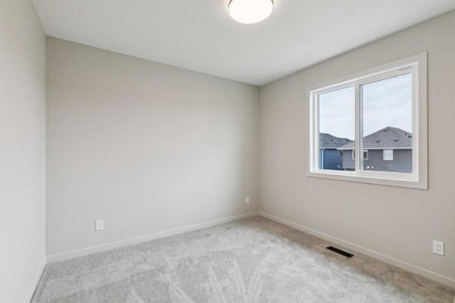 660 Clearwater Heath, Chestermere, AB - Indoor Photo Showing Other Room