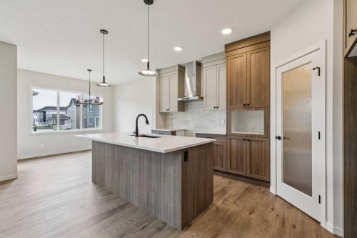 660 Clearwater Heath, Chestermere, AB - Indoor Photo Showing Kitchen With Upgraded Kitchen